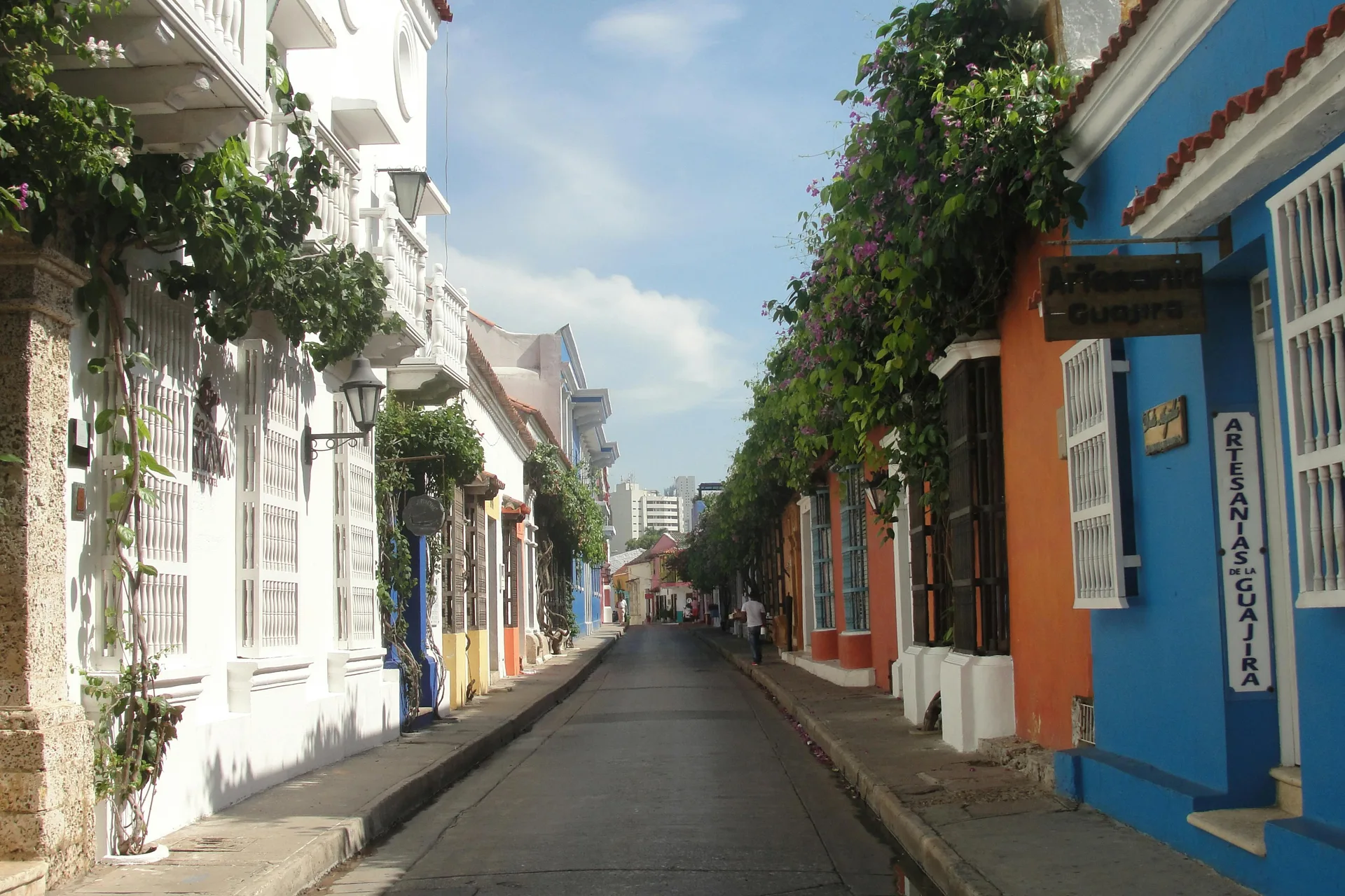 Cartagena's harbor and skyline as the city manages pico y placa restrictions, water rationing, and the World Cup knockout round.
