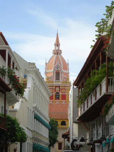 A stunning view of Cartagena's cathedral tower framed by colonial architecture, capturing the essence of this Colombian city's historic charm.